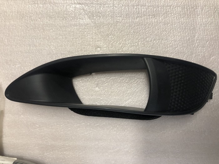 Облицовка противотуманной фары левая TOYOTA COROLLA E120 2001-2006 5212802051