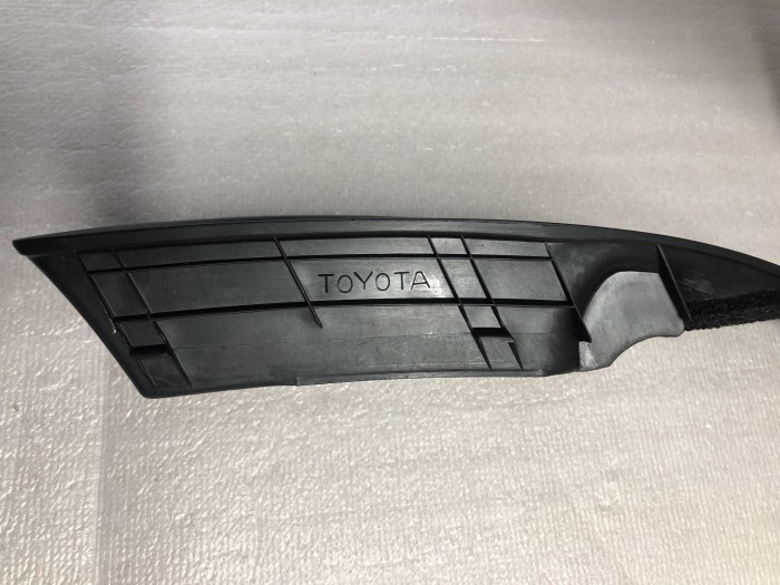 Облицовка противотуманной фары передней левой TOYOTA Corolla Е120 5212812110