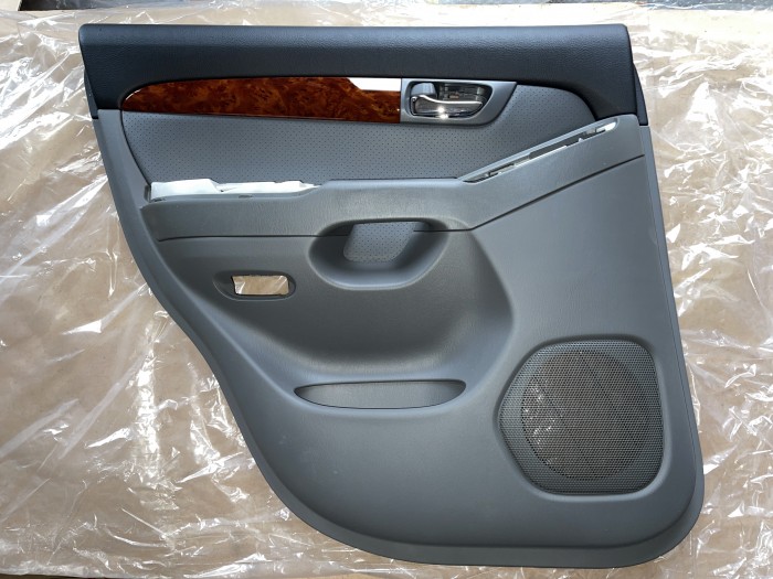 Обшивка двери задней левой Toyota Land Cruiser Prado 120 2002-2009 6764060770B0